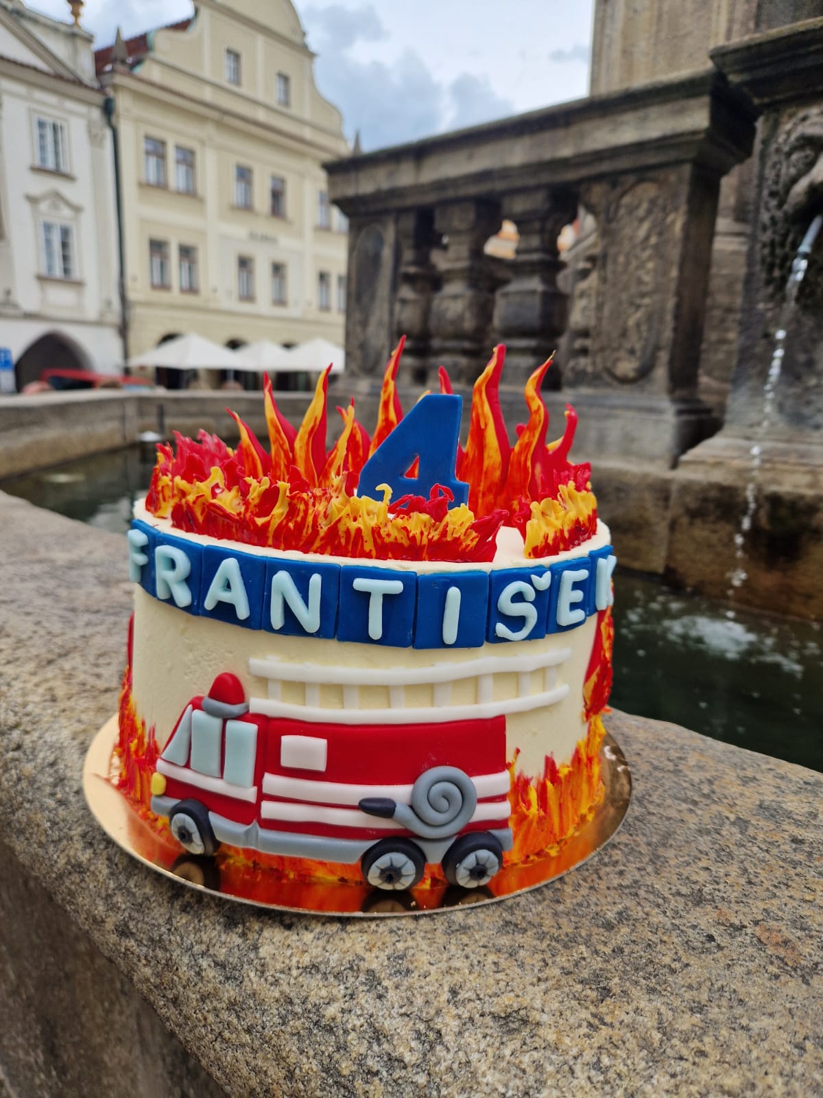 Firefighter birthday cake with a fire truck and flames for František