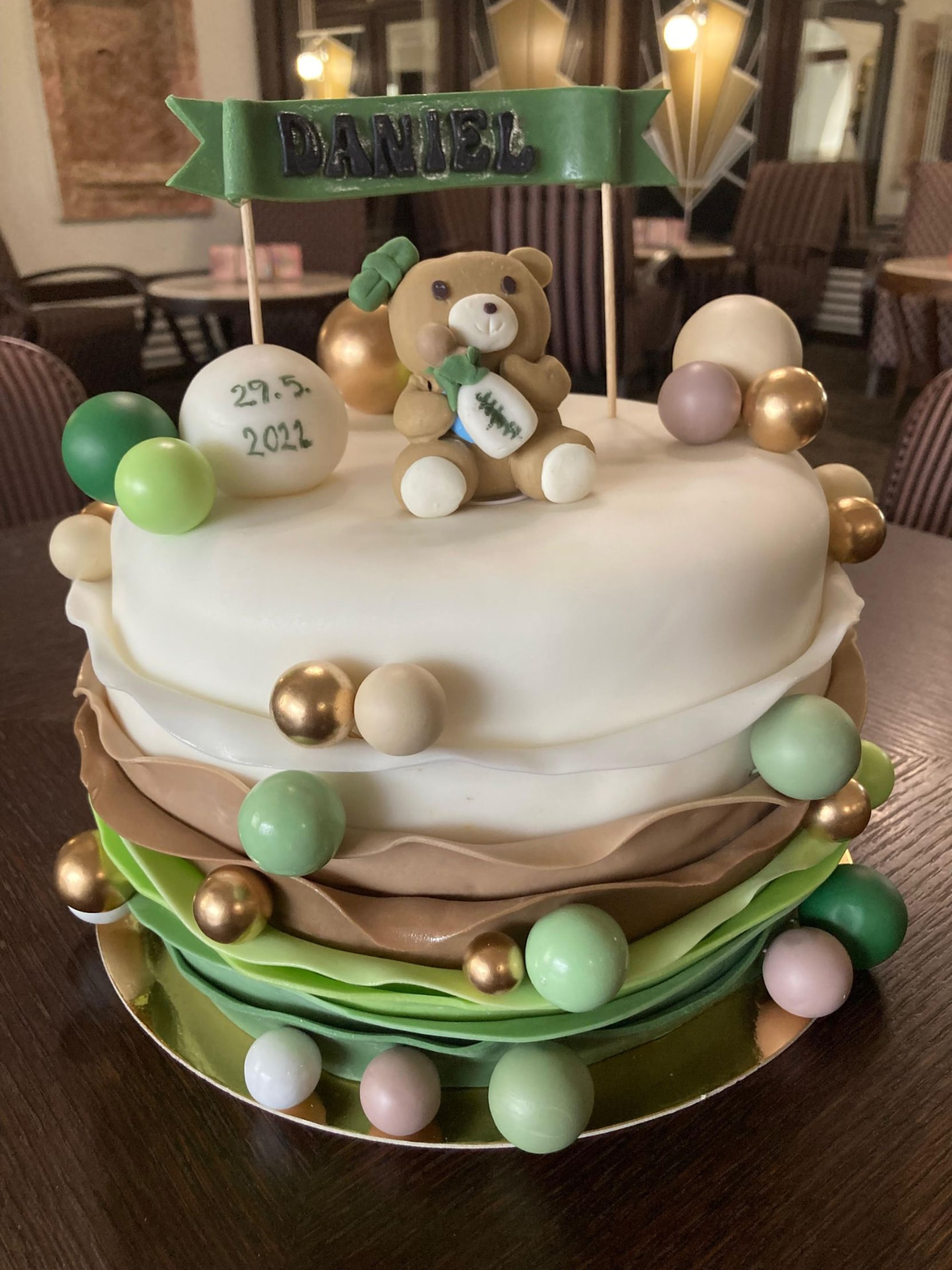 Christening cake with a teddy bear and the name Daniel